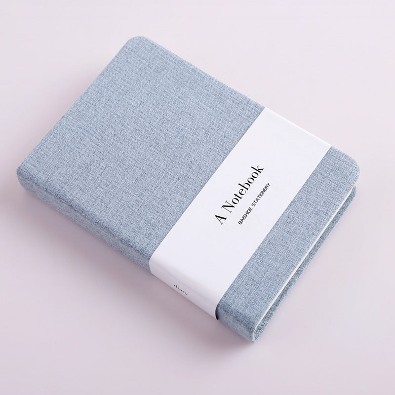 Notebook with a cloth cover