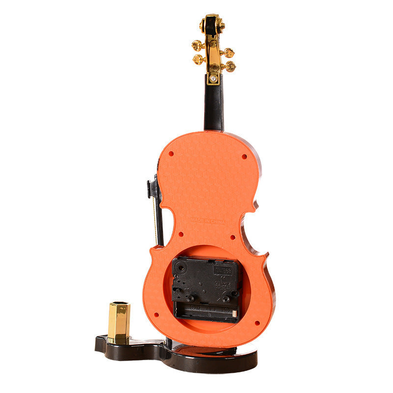 Violin pen inserted alarm clock