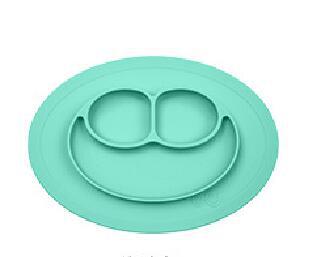 Children's meal pad with silicone smiling face plate